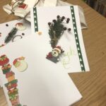 dzieci tworzą wianuszki adwentowe i kartki świąteczne