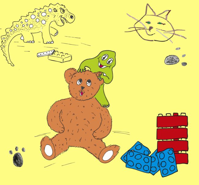 okładka książki pt. "Bajki-pomagajki"; miś ze stworkiem na głowie, kotek, dinozaur, klocki