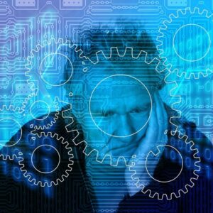 zmartwiony senior, wokół niego otoczka imitująca cyfrowy świat